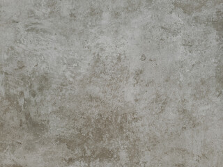 Textured grey surface resembling aged stone or concrete tile, ideal for backgrounds, architectural elements, or material samples