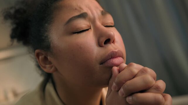 Stressed disappointed suffering African American woman feeling grief thinking problem at home upset depressed ethnic girl female worry anxious panick attack unwanted pregnancy trouble stress emotion