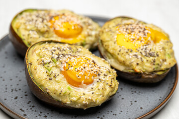Roasted Avocado with Egg Filling and Chia Sesame Topping