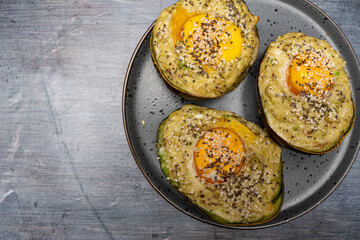 Baked Avocado Egg Boat with Chia and Sesame Seeds – Top View Composition