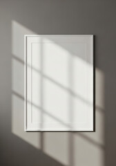 Clean white book or frame with subtle texture featuring geometric window shadow patterns across its surface.