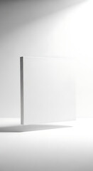 Clean White Blank Book or Paper Stack in Minimalist Studio Setting