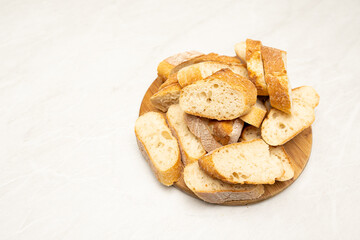 Rustic Sliced Baguette on Wooden Board, Overhead Shot with Blank Space for Text
