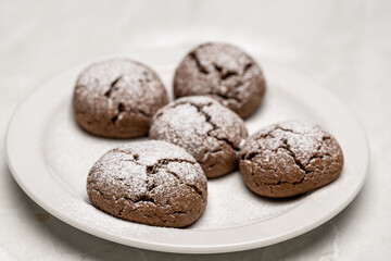 Delicious Chocolate Cookies with Cream Cheese Filling and Powdered Sugar Dusting