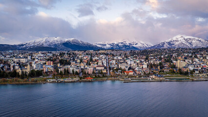 Fototapeta premium Panoramic aerial view of San Carlos de Bariloche with snowy Andes mountains in Patagonia.