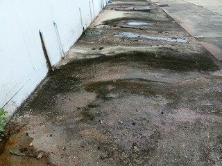 Dirty Concrete Floor with Water Stains and Mold