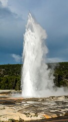 Geyser erupting, steam plume, Yellowstone