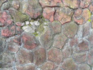 Texture of a stone wall. Old castle stone wall texture background. Stone wall as a background or...