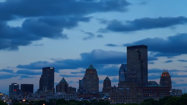 City skyline at sunset with dramatic clouds, inspiring travel and business hub visual for destination guides, time-lapse edits and global urban growth stories