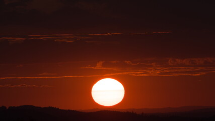 Sunset with glowing orange sky over the horizon, Czech Republic