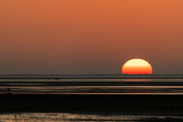 A beautiful view of the setting sun in bay of bengal inside Marine National Park on the outskirts...