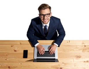 A confident businessman wearing glasses, smiling as he works on a laptop placed on a