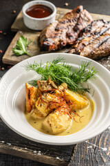 Chicken fillet in creamy mustard sauce with herbs