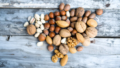 Mixed Nuts Flatlay Composition on Rustic Wooden Surface. Bishvat jewish festival. Generated Image