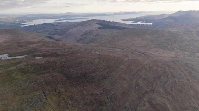 Aerial view from priest's leap mountain range looking towards kenmare bay in county kerry, ireland.