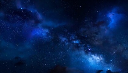 Obraz premium A dark, celestial panorama ablaze with countless stars, nebulas, and galaxies. Deep blues and purples dominate the cosmic vista