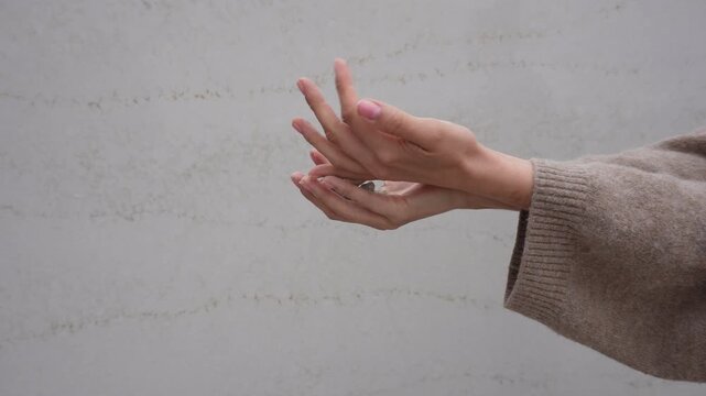 woman hands touching stones