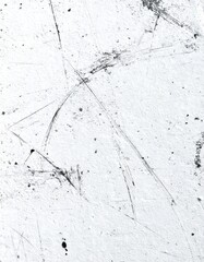Abstract white surface with dark scratches and marks