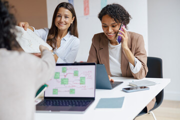 A dynamic business meeting showcasing the importance of teamwork and effective communication among...