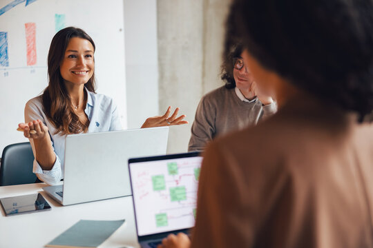 A vibrant and engaging team discussion that showcases effective collaboration and innovative ideas in an office setting