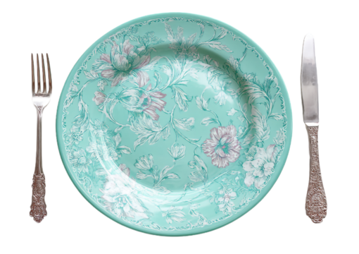 Overhead shot of a fancy silver fork and knife on a decorative plate isolated on transparent background isolated on a transparent background - Powered by Adobe