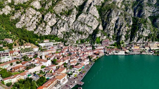 Limone sul Garda. Aerial 4K drone video footage of panoramic Garda lake and Italian Alps mountains. Lombardy drone landscape