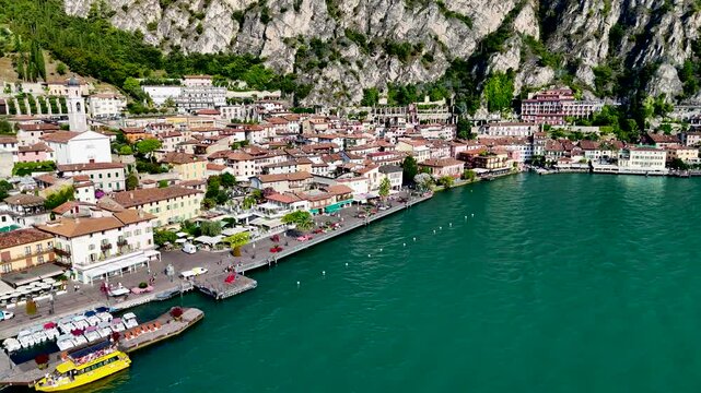 Limone sul Garda. Aerial 4K drone video footage of panoramic Garda lake and Italian Alps mountains. Lombardy drone landscape
