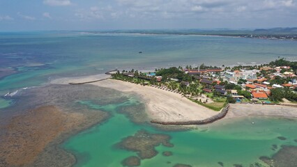 Fantastic panoramic view of Serrambi beach with coral reefs, natural swimming pools in the sea,...