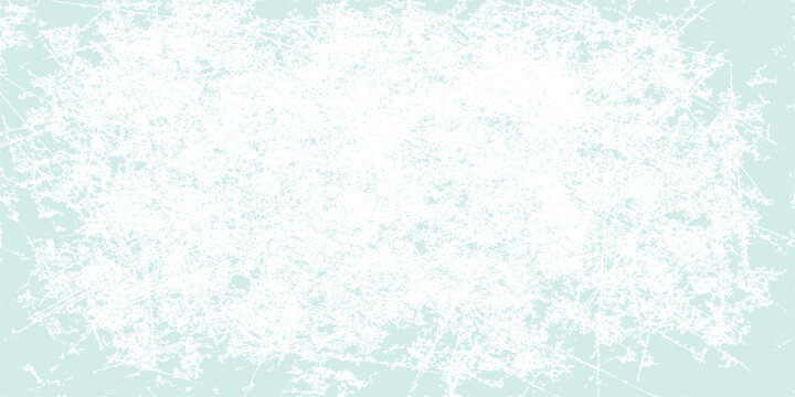 Abstract blue grunge background with a frozen winter snowflake pattern and texture