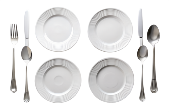 Four white plates with cutlery isolated on white background