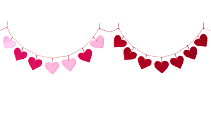 Two garlands of pink and red heart shapes hanging on white background. 
