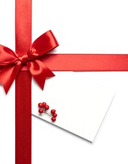 Red ribbon bow with tag