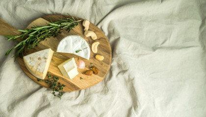 Flatlay of Assorted Cheeses with Fresh Herbs. Shavuot Jewish Festival. Generated Image