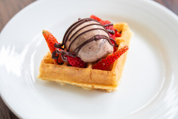 variety of breakfast items, breads, eggs, waffles, cereals, and cheeses