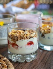 variety of breakfast items, breads, eggs, waffles, cereals, and cheeses