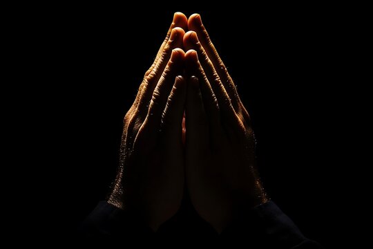 Praying Hands Silhouette on Transparent Background in Dramatic Lighting