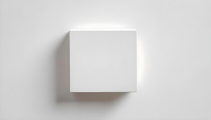 Minimalist white square on a white background with soft lighting and shadows.