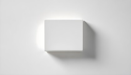 A minimalist white square shape casting a shadow on a white background.