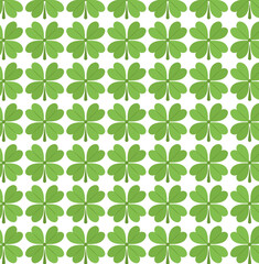 Seamless pattern of green four leaf clovers on a white background