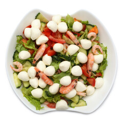 Fresh summer salad with shrimp, cucumber, tomato, lettuce and mozzarella in bowl
