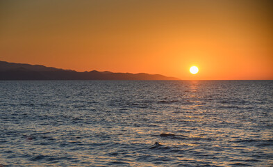 Sun Setting into Mediterranean Sea at Sunset in Cyprus