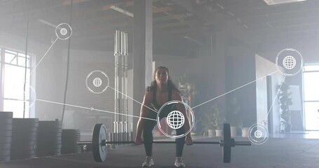 Fitness athlete gripping barbell doing deadlift to clean press with data graphs for analysis - Powered by Adobe