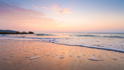 Beautiful orange summer sunsets cast a warm glow across the sky and sea, their gentle waves lapping at the sandy coast