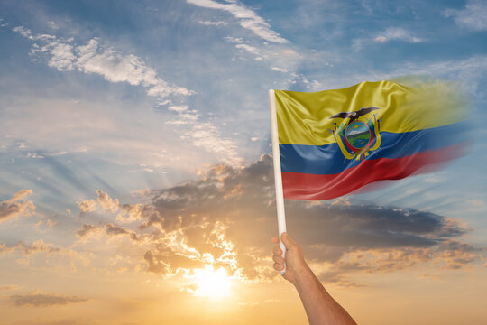 National flag of Ecuador waving in people hand on Independence day