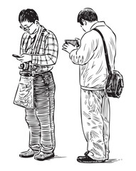 Two casual young men looking at smartphone, standing outdoors, tourists, realistic sketches, vector hand drawings isolated on white background