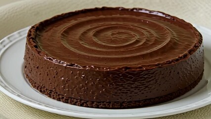 Decadent rich chocolate tart with glossy swirl topping, a sweet dessert indulgence - Powered by Adobe