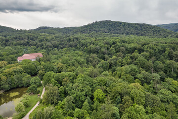 Obraz premium Green hills and forest landscape in summer. Chynadiieve, Ukraine.