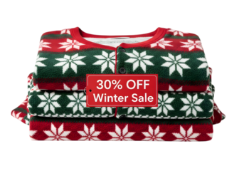 Stack of cozy winter pajamas with a snowflake pattern isolated on transparent background with a 30 off sale tag