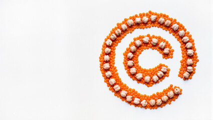 Creative arrangement of popcorn and orange dots forming a symbol