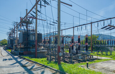 Fototapeta premium High voltage switch. High voltage electrical transformer substation. Power station. Power line.